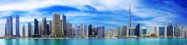 Dubai city emirate United Arab Emirates luxury shopping lively nightlife scene Burj Khalifa skyscraper filled skyline foot artificial islands offshore Atlantis Palm resort water marine-animal parks UAE ইউএই সংযুক্ত আরব আমিরাত মারহাবান বিখ্যাত বুর্জ খলিফা বুর্জ আল আরব দুবাই টাওয়ার ১৬০ তলাবিশিষ্ট আকাশচুম্বী দুবাই শহর সংযুক্ত আরব আমিরাত